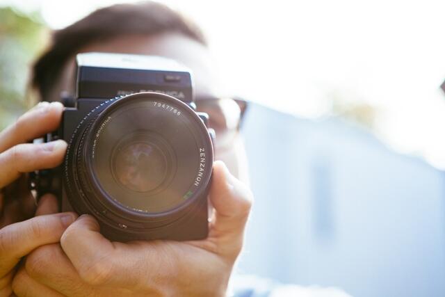 man-person-camera-taking-photo