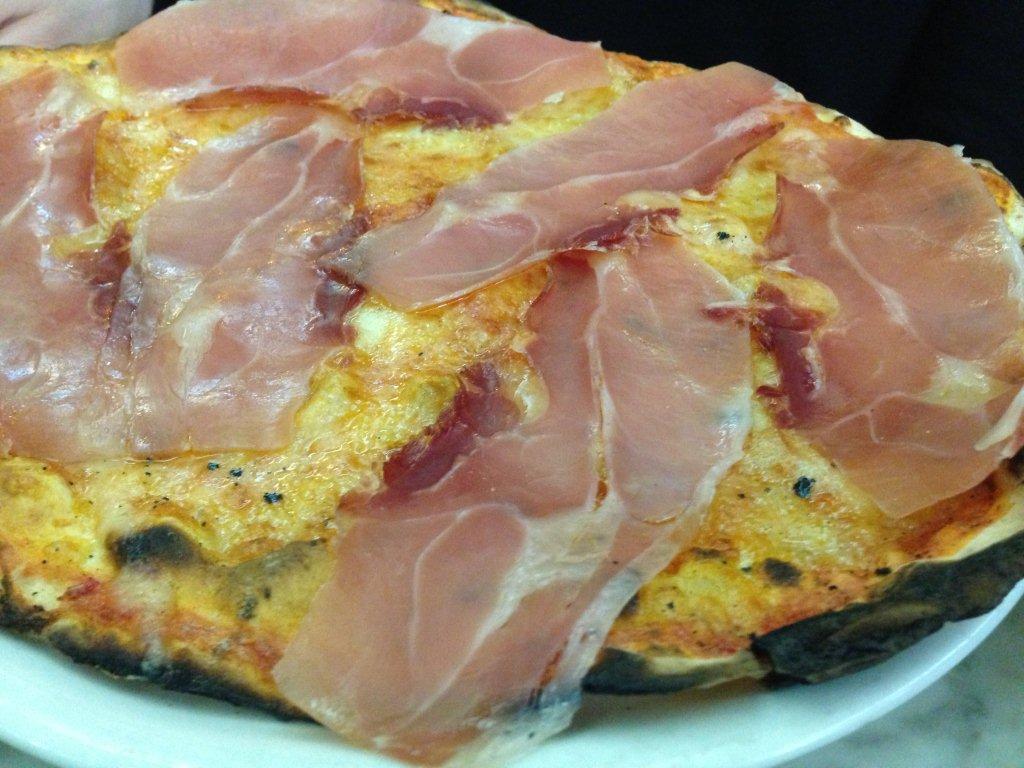 Classic prosciutto pizza at Ai Marmi