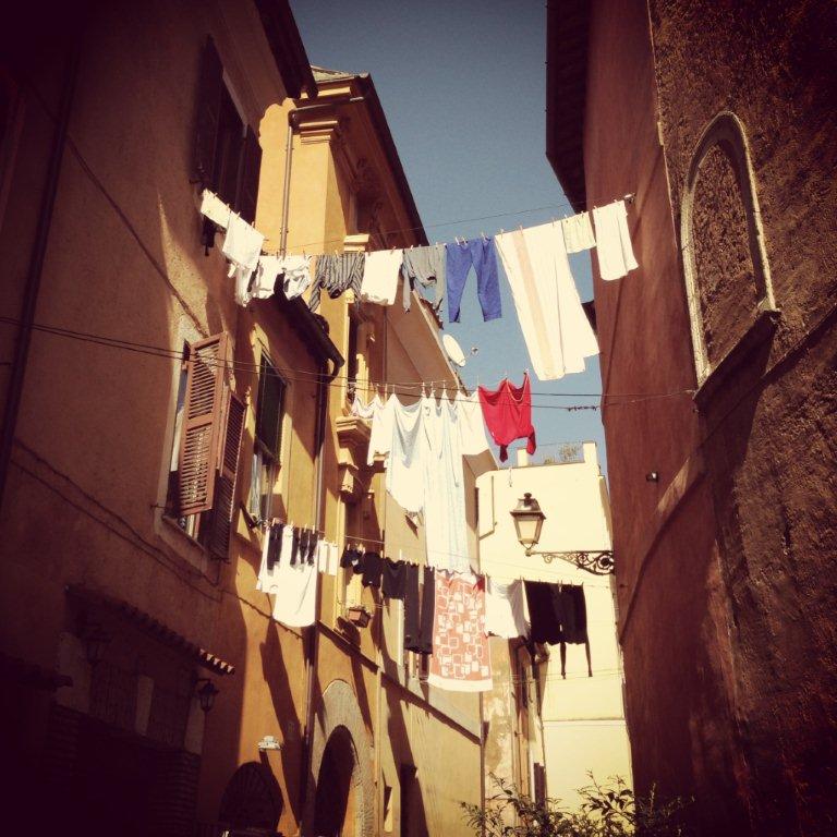 A quintessential Trastevere street with clothes hanging to dry