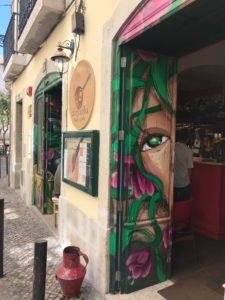 restaurant with street art on door