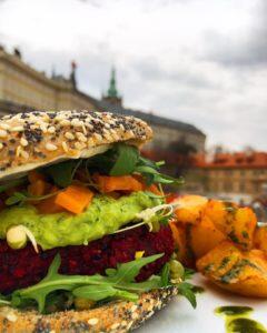 veggie burger with a view behind of Prague