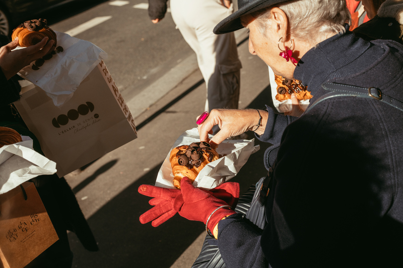 Guests taking their first bite of a freshly baked croissant