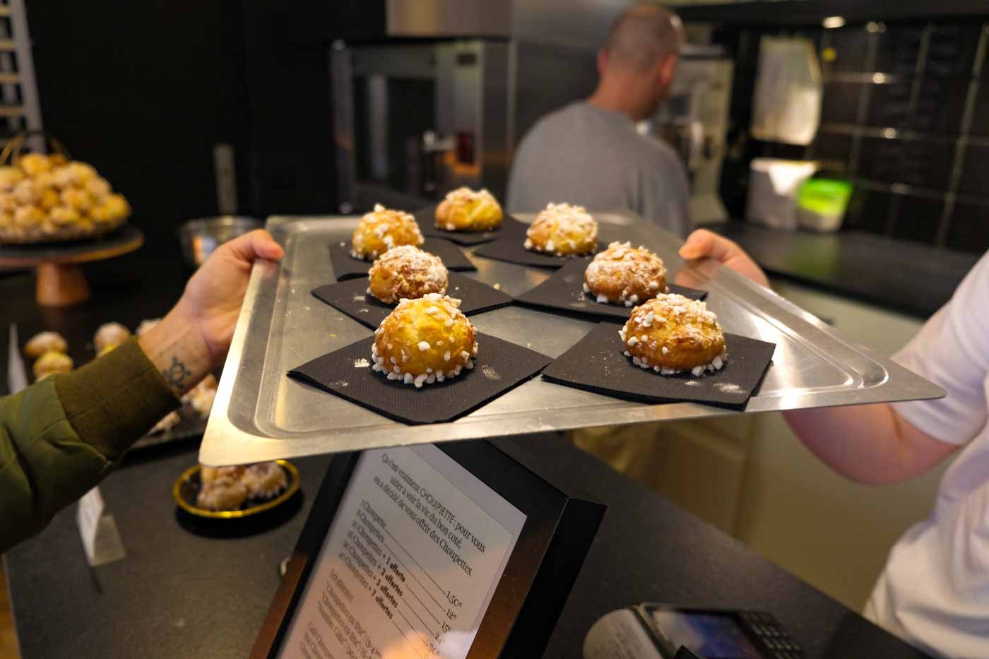 CLOST_UP_OF_TRAY_OF_CREAM_PUFFS_AT_CHOUPETTES_DE_CHouchou_Paris