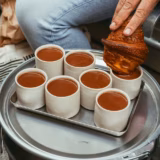 Croissant_dipping_into_chocolate_Plaq_Paris
