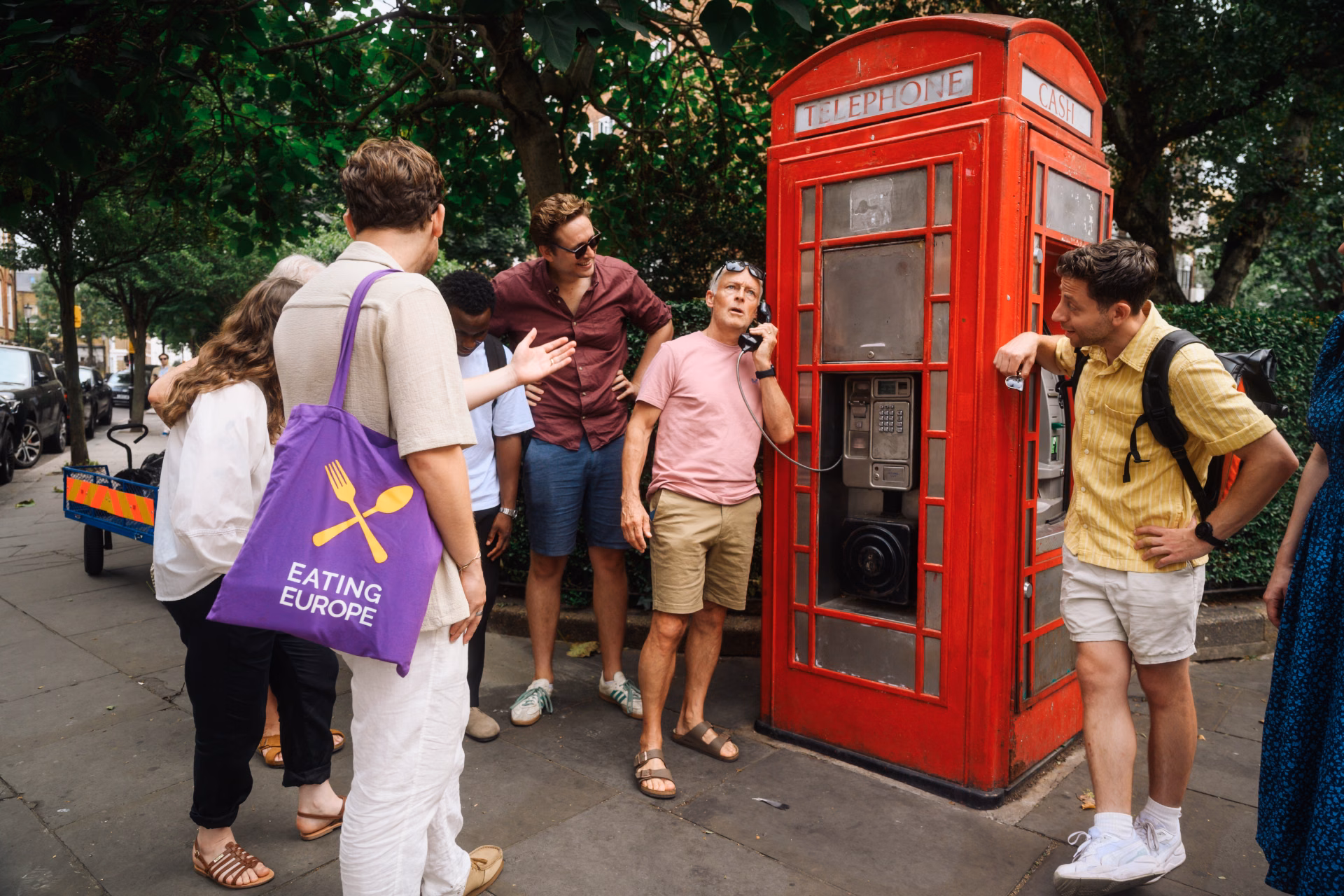 A guide with the group in London
